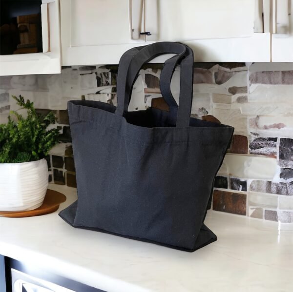 Customize your tote bag with your own text or image! Whether you need a personalized tote bag for yourself, promotional purposes, or as a trade show gift, we've got you covered. Our custom shopper bags are perfect for all your shopping needs. Black Colour - Image 2
